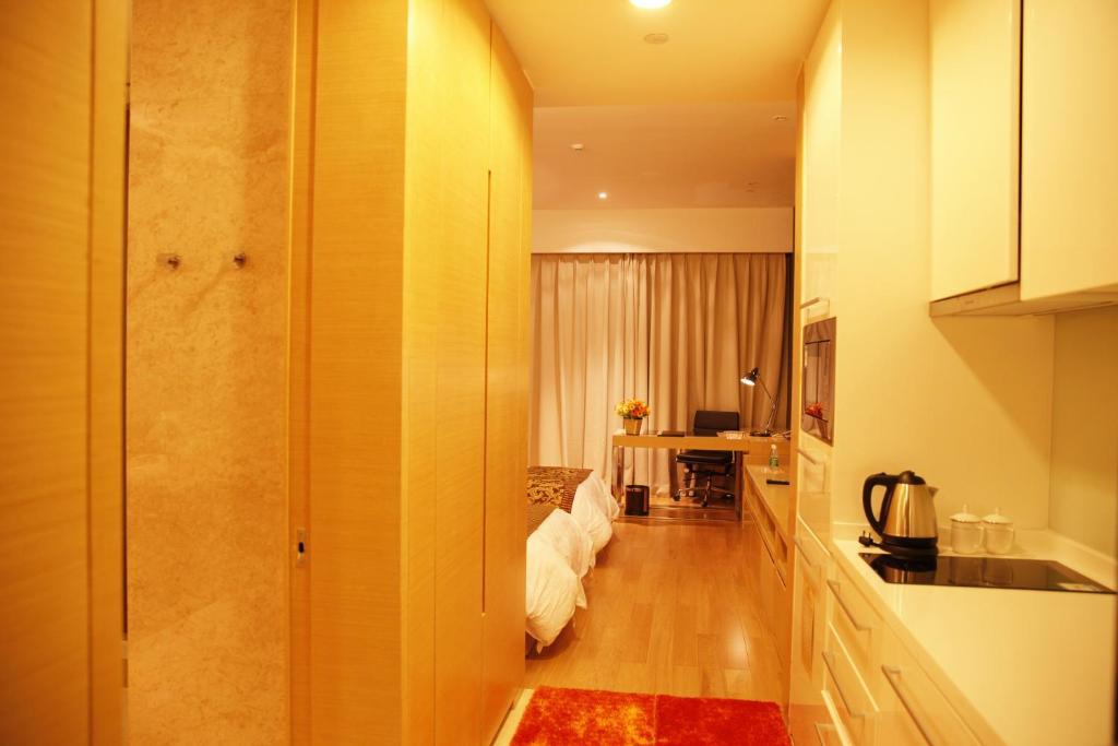 Checkinn International Apartment Cantón Habitación foto