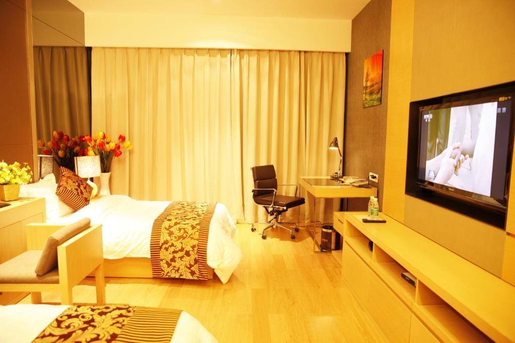 Checkinn International Apartment Cantón Habitación foto